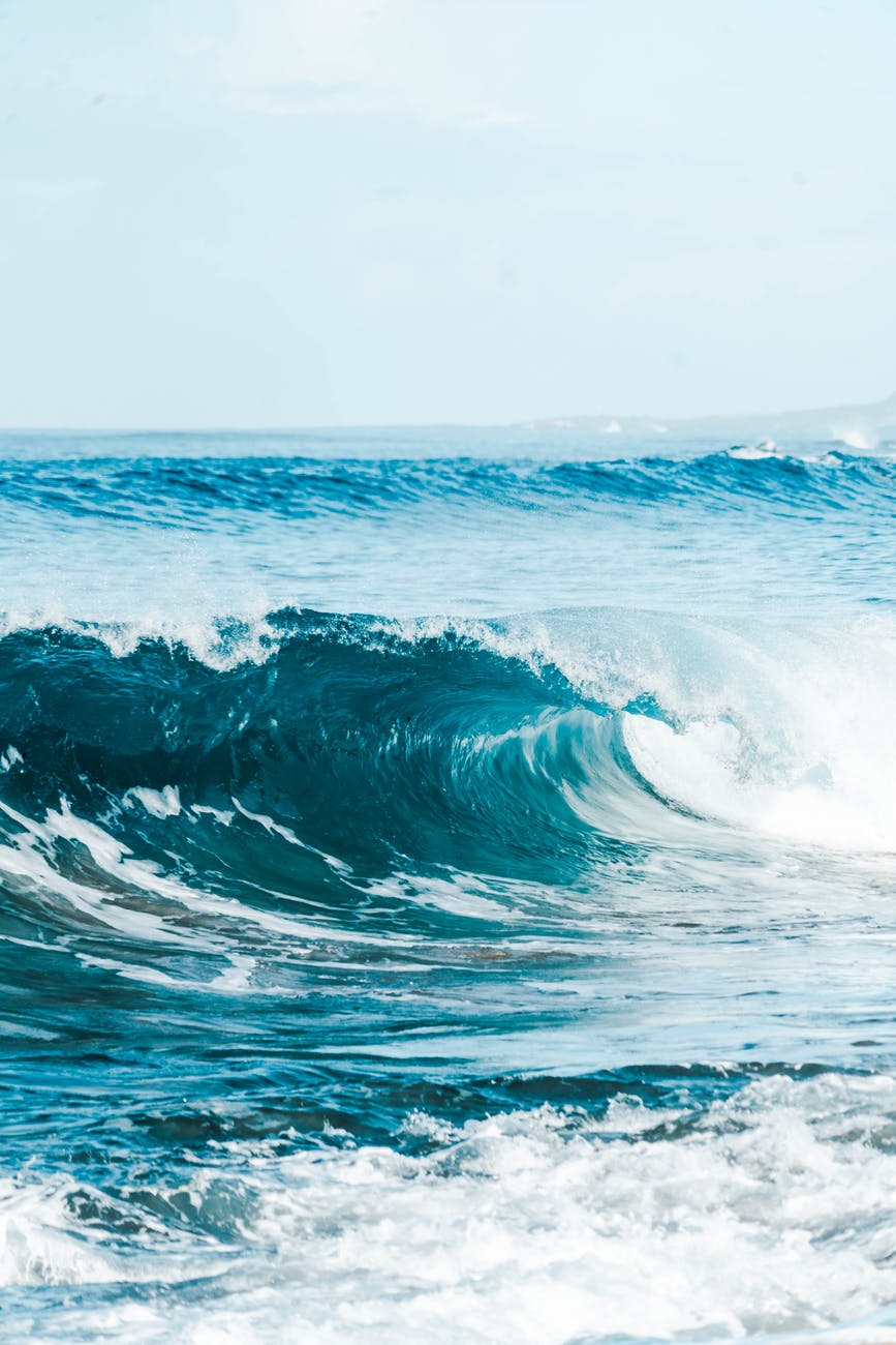 stormy sea with foamy waves on sunny day